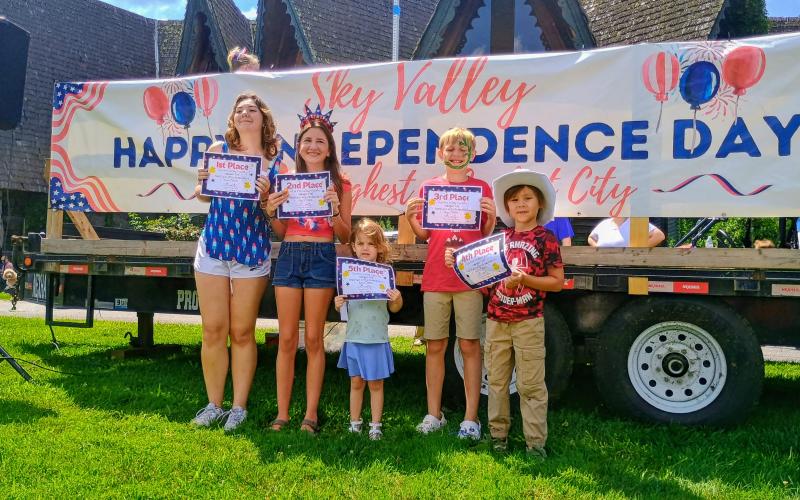 Megan Horn/The Clayton Tribune. Over 515 ducks made their way down the creek in Sky Valley for the annual Rubber Duck Race on July 5. Pictured are top five winners Elora Bunn, who received first place with duck number 79, left; Annalyn Garrison, who received second place with duck number 532; Molly Robinson, who received fifth place with duck number 255; Banks Kyburz, who received third place with duck number 512; and Jackson Pyle, who received fourth place with duck number 490.