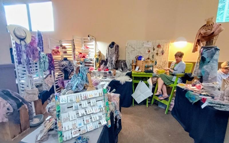 Megan Horn/The Clayton Tribune. Brenda Hutchings demonstrates how she makes her fiber arts creations during the Painted Fern Art Festival Saturday, July 12, and Sunday, July 13. The annual show is presented by the North Georgia Arts Guild.