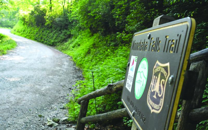 Enoch Autry/The Clayton Tribune. An arrest has been made after a man in a pickup reportedly pointed a crossbow at a female on Bear Gap Road near the Minnehaha Falls Trail.