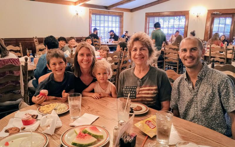 Megan Horn/The Clayton Tribune. Hudson Rathbun, 6; Isabelle Depa; Nora Rathbun, 3; Rita Houck and Steven Rathbun enjoy July 4 festivities and a delicious BBQ buffet at The Dillard House.