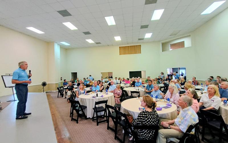 Megan Horn/The Clayton Tribune.  Greg Rhodes, chairman of the F.A.I.T.H. Board of Directors, thanks the community and donors for their support of F.A.I.T.H.’s Capital Campaign during the June 26 groundbreaking of the Power House Child Advocacy Center and Sexual Assault Center.