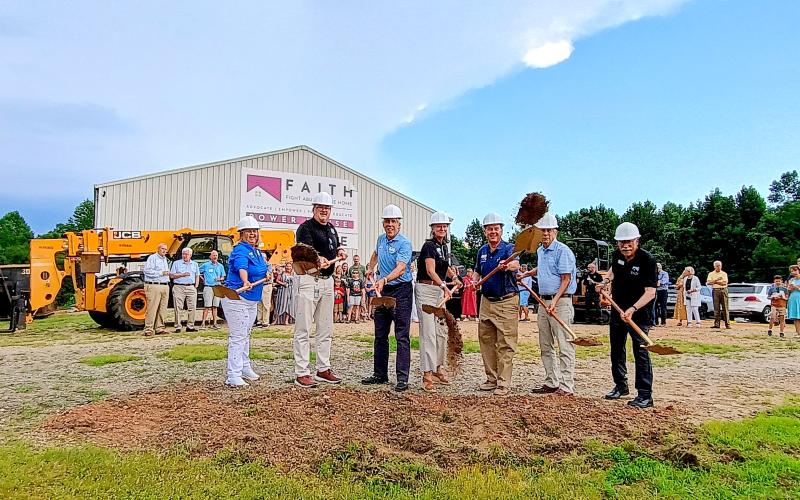 Megan Horn/The Clayton Tribune.  Pictured are Donna Speed, F.A.I.T.H. Board of Directors secretary; Jay Neal, director of the Criminal Justice Coordinating Council (CJCC); Greg Rhodes, chairman of the F.A.I.T.H. Board of Directors; Caroline Wallis, executive director of F.A.I.T.H.; Dr. Tom West, president of the F.A.I.T.H. Board of Directors; Tom Lines, treasurer of the F.A.I.T.H. Board of Directors; and Mark Smith, Director of the Power House Child Advocacy Center and Sexual Assault Center.