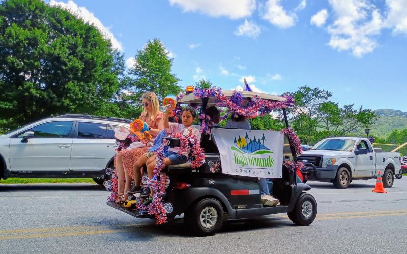 Megan Horn/The Clayton Tribune. High Grounds Consulting was one of over 37 patriotic parade participants in Sky Valley last weekend.