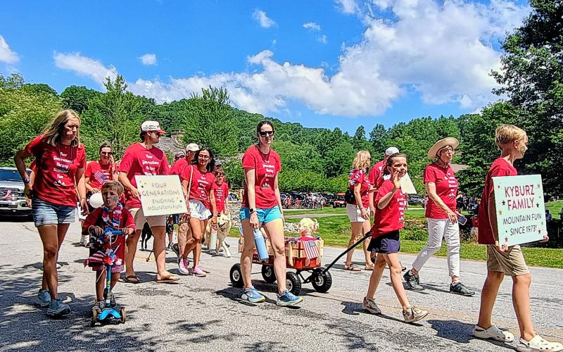 Megan Horn/The Clayton Tribune. The Kyburz Family has been having “Mountain Fun since 1973!” and was featured in matching shirts in Sky Valley on Saturday, July 5. The family celebrated Independence day and held up a sign stating “four generations enjoying mountain fun.”