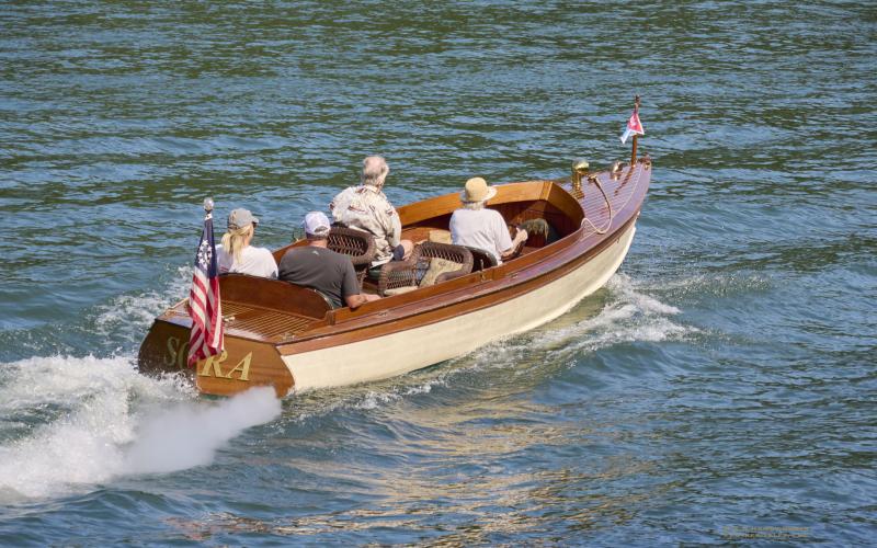 Photo courtesy K.A. Hamdy-Swink. This 1906 Launch 26-foot boat named “Sora” is owned by Jill and Darrell Dyas and is the oldest wooden boat on Lake Rabun. It set sail during Independence Day weekend.