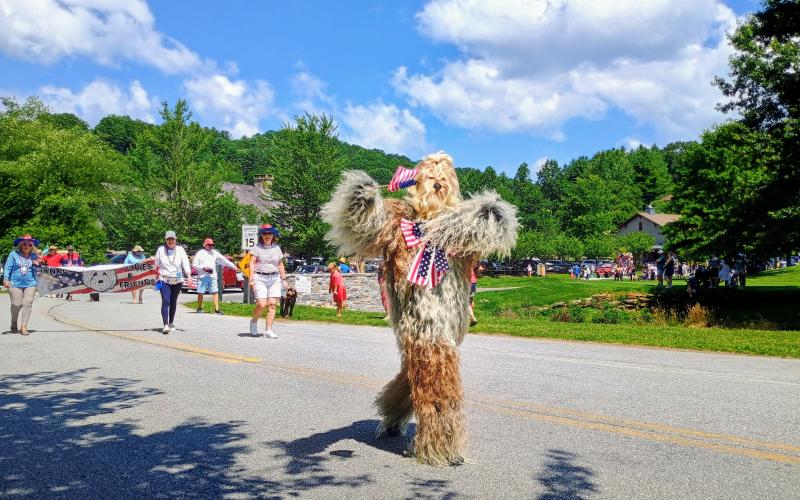 Megan Horn/The Clayton Tribune.  Bigfoot makes his way into Sky Valley’s Grand Parade on Saturday, July 5. Noryce Burgey is dressed as the sasquatch creature.