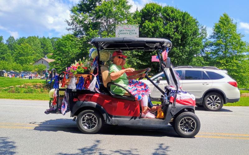 Megan Horn/The Clayton Tribune. Sky Valley Garden Club was one of over 37 participants in Sky Valley’s Grand Parade on Saturday, July 5. They sported this patriotically-decorated golf cart.