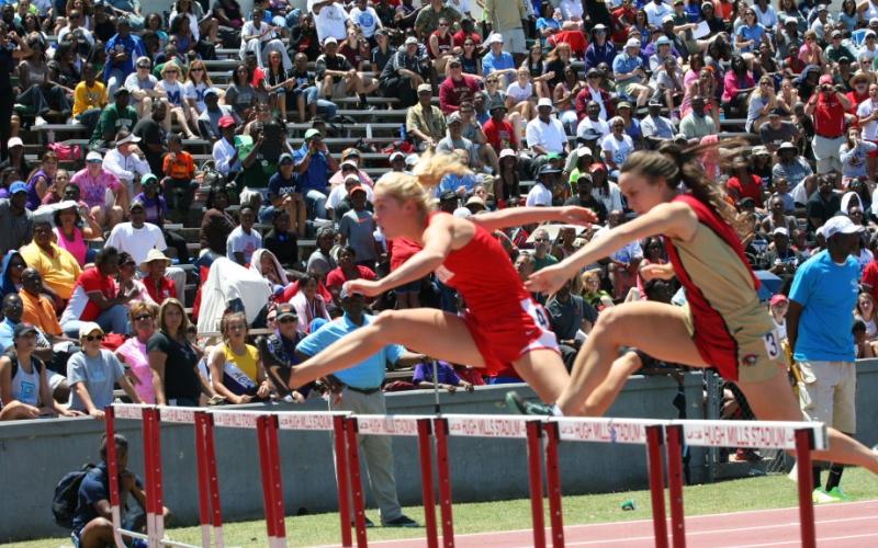 Submitted. Rabun County’s Sally Woerner (left) clears a hurdle during the state finals of 2014.