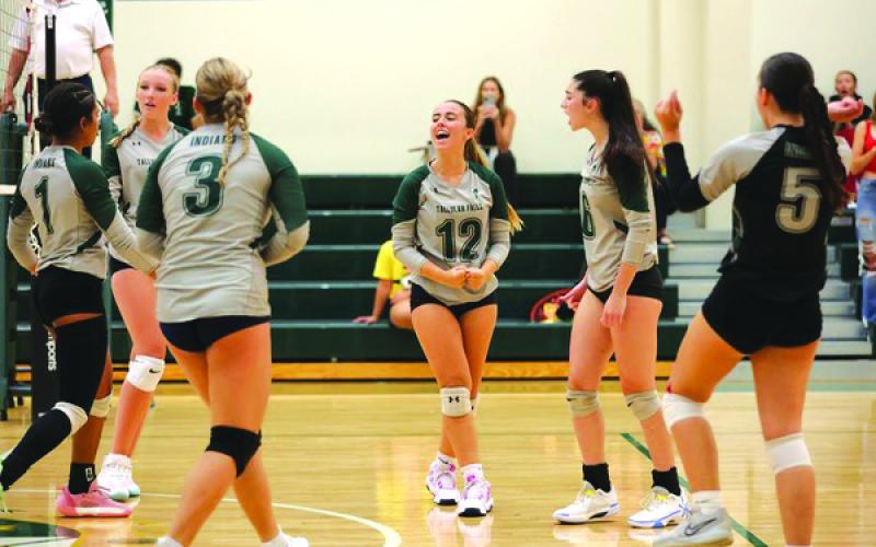 Submitted Photo. Tallulah Falls volleyball players Margalida Amengual Sanchez and Shelby Simmons celebrate a point. The Lady Indians are now 11-5.
