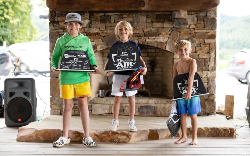 Submitted photo. In the GROM Division, (from left) Hayes Andrews was second; Bode Rhino first; and Watson McElveen third at the classic on Lake Burton.
