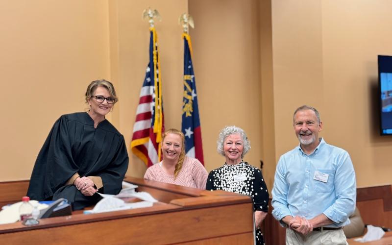 Submitted photo. Aleta Yates, Kirk Yates, and Christie McDowell have recently been sworn in as CASAs by the Chief Juvenile Court Judge of the Mountain Judicial Circuit. They will be speaking up to advocate for the best interests of children in foster care in Banks, Stephens, Habersham and Rabun counties.