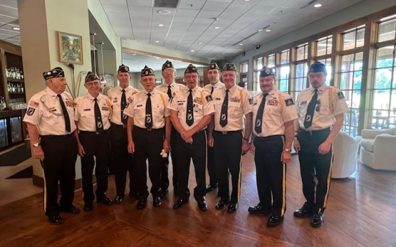 Photos courtesy Sherron Van Camp. The Grant Reeves Honor Guard posts the colors during a special ceremony honoring Purple Heart recipients hosted by the Sky Valley Property Owners Association (POA). Pictured are Doug Wayne, left, Bill Mc Allister, Jon Jones,  David Ruth,  Ed Hendricks, Gary Cantwell, Jim Morgan, Rick Chaffin, Kenneth Franklin and Brady Morgan.