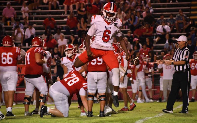 Wesley Branch/The Clayton Tribune. Rabun County junior linebacker JK Fruster celebrates after a sack versus Dalton on Sept. 5. The Wildcats defeated the Catamounts 49-42 to improve to 3-0.