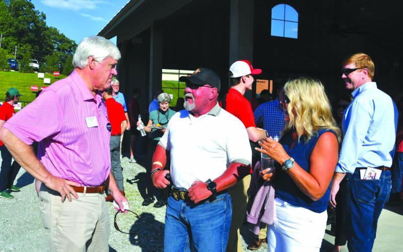 Enoch Autry/The Clayton Tribune. Rabun County Sheriff Mark Gerrells talks with Bill Cowsert at the Rabun County Republican Party Low Country Boil on Sept. 13 at the Civic Center Pavilions.