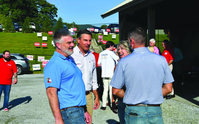 Enoch Autry/The Clayton Tribune. State Rep. Victor Anderson and U.S. Senate candidate Derek Dooley share a laugh at the Rabun County Republican Party Low Country Boil on Sept. 13 at the Civic Center Pavilions.