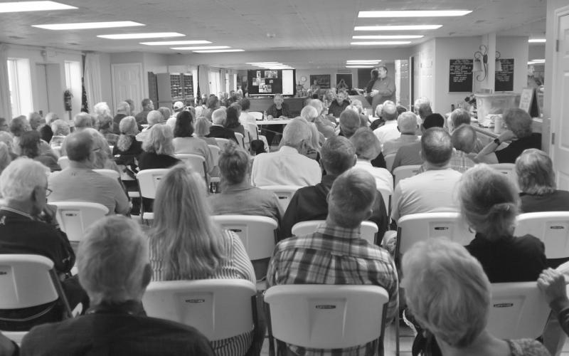 Enoch Autry/The Clayton Tribune. Sky Valley City Manager Jason Streetman talks to the nearly 200 people in attendance for the sewer system discussion on Oct. 3. The city is awaiting word on if their second grant request has been approved.