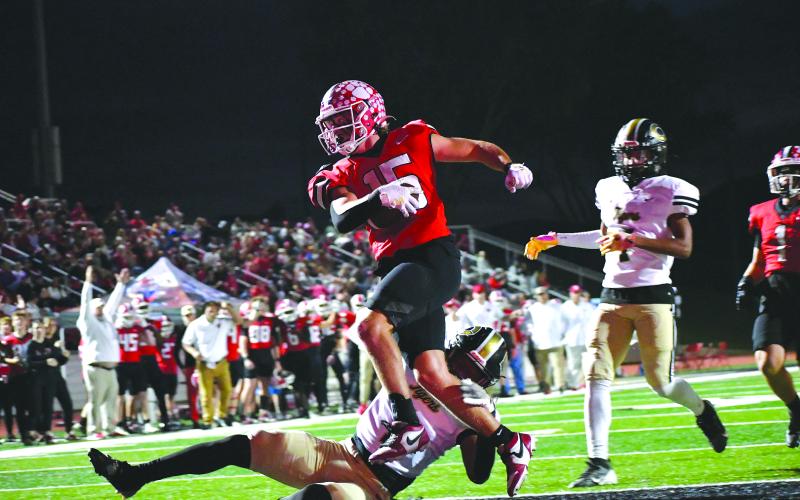 Enoch Autry/The Clayton Tribune. Reid Giles goes into the end zone for one of the senior’s six TDs on Oct. 3 versus Commerce. RCHS is on the road at Oglethorpe County Friday.