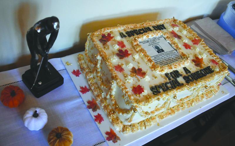 Enoch Autry/The Clayton Tribune. A cake with a copy of the dedication information for Jim Bleckley was created for the Oct. 24 ceremony at the county’s welcome center.