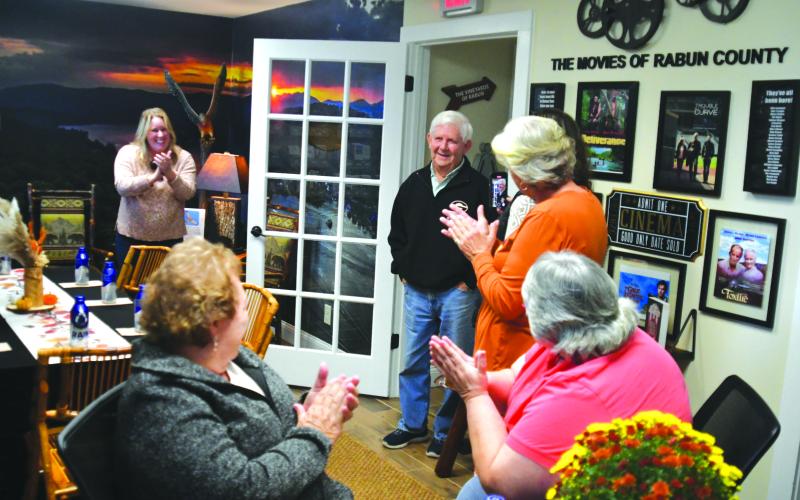 Enoch Autry/The Clayton Tribune. Bleckley is greeted at the door by friends who were awaiting his arrival to the welcome center on Oct. 24.