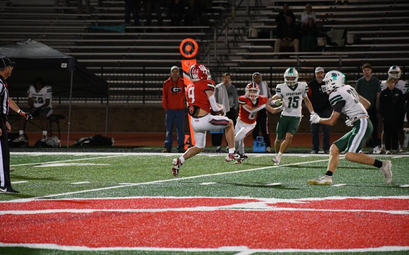 Wesley Branch/The Clayton Tribune.  Wildcat sophomore linebacker Brock Brady intercepts a deflected pass from Spartans quarterback Chap Chapman. Brady had an interception and a sack in Rabun County’s 49-46 loss to Athens Academy on Oct. 24.