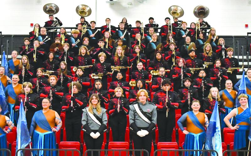 Submitted Photo. The RCHS marching band poses for a photo at the beginning of the school year. The Wildcats claimed straight superior rankings at the Berkmar Marching Invitational on Oct. 18 in Lilburn, Ga. While the marching competition season is complete, the band will play a Veterans Day concert of patriotic music with the RCHS chorus on Nov. 13. Then the band will share the stage with the middle school and elementary school bands at their Christmas concert on Dec. 9. Both concerts will be in the high sc