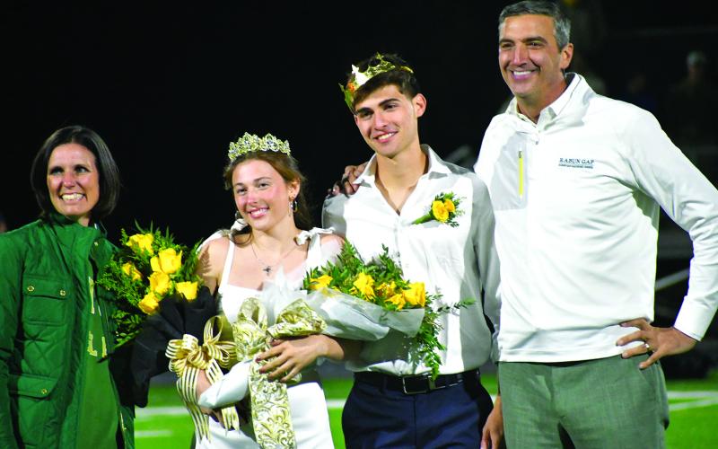 Enoch Autry/The Clayton Tribune. At halftime of the Rabun Gap-Charlotee Christian football game on Oct. 10, Cassidy Klimasewski and Nicolas Bruce were crowned Homecoming Queen and King, respectively. The two Rabun Gap seniors who were part of the Homecoming Court were crowned by Head of School Jeff Miles and his wife Kiana.