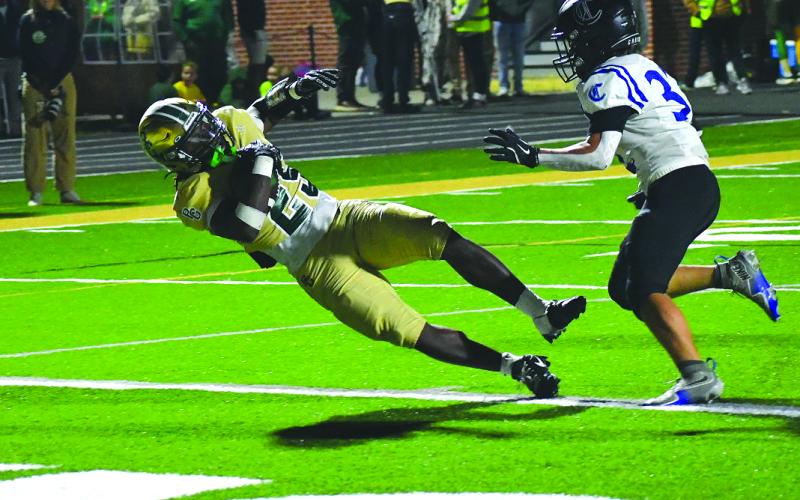 Enoch Autry/The Clayton Tribune. Junior running back Jordan Lindo goes into the end zone for one of his two rushing touchdowns in the game. Lindo finished the night with 114 yards on the ground on 14 carries.