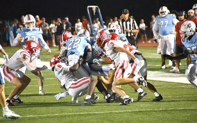 Wesley Branch/The Clayton Tribune. Rabun County junior linebacker JK Fruster (6) and a group of Wildcat defenders make a tackle on a kickoff return versus Providence Christian Academy in the Wildcats’ 62-21 win. RCHS plays Commerce Friday.