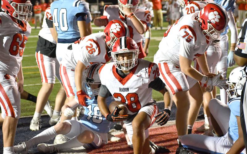 Wesley Branch/The Clayton Tribune. Rabun County freshman running back Amir Thompson stands up after fighting into the end zone for his first career touchdown in the Wildcats’ 62-21 win over the Storm on Sept. 26.