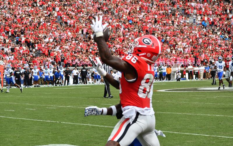Wesley Branch/The Clayton Tribune. Georgia wide receiver Dillon Bell brings in a one-handed catch on the sideline in Georgia’s 35-14 victory over Kentucky. Bell had two rushing touchdowns and led the Bulldogs in receiving in the win.