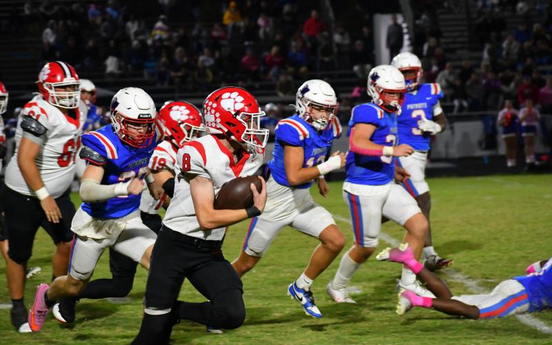 Wesley Branch/The Clayton Tribune. Wildcat sophomore Colter Cannon runs after a screen pass from Ty Truelove for a big gain versus the Patriots of Oglethorpe County on Oct. 10. Cannon totaled 68 receiving yards and a touchdown in the 28-19 loss.