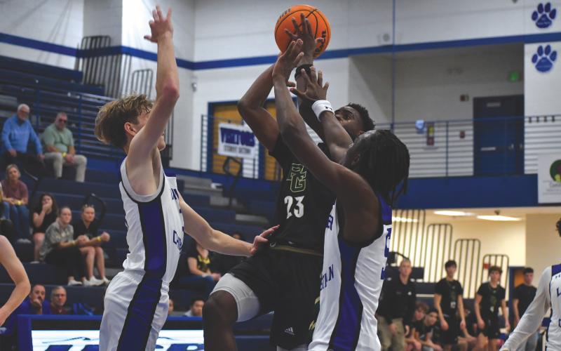 Wesley Branch/The Clayton Tribune. Rabun Gap junior Mikey Williams drives to the basket in Rabun Gap’s season-opening 88-73 win over Lanier Christian Academy on Nov. 8 at Banks County High School. Williams scored 31 points off the bench.