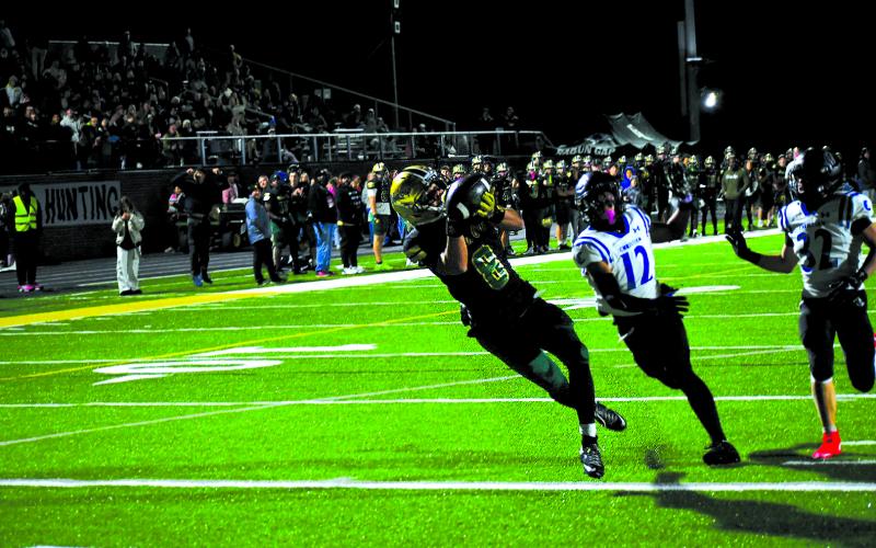 Enoch Autry/The Clayton Tribune. Rabun Gap senior Isaac Obrokta, a Georgia Tech commit, pulls in a 39-yard touchdown reception from quarterback Gavin Owens in the Eagles’ 55-48 semifinal loss to Charlotte Christian on Nov. 14.