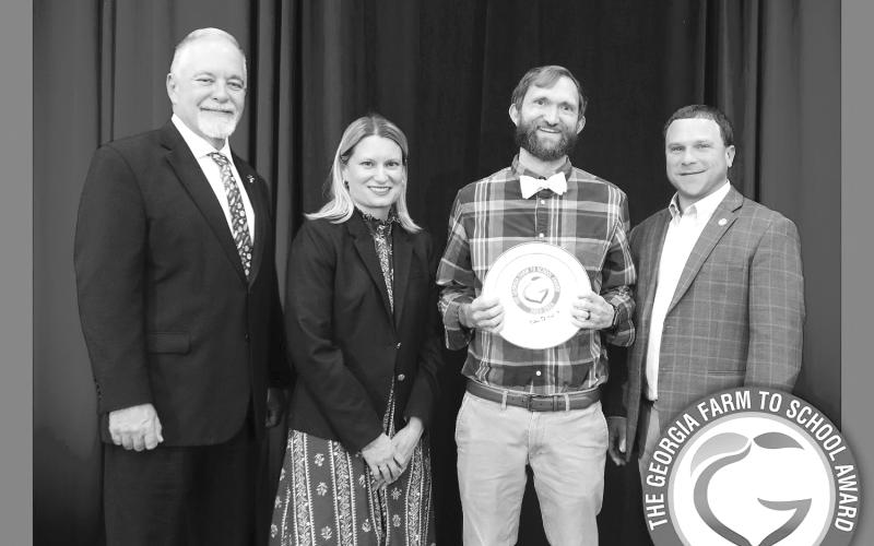 Submitted Photo. Earlier this month, Rabun County Nutrition Director Ansley Fowler (third from left) was presented the 2024-2025 Georgia Farm to School Award by State Superintendent of Schools Richard Woods; Holly Thaw, assistant director for GaDOE School Nutrition Division and Georgia Commissioner of Agriculture Tyler Harper.