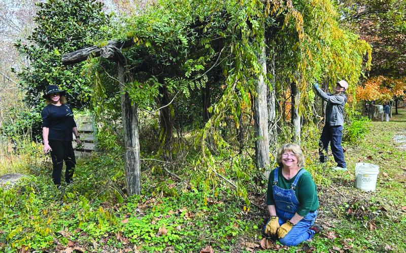 Submitted Photo. Master Gardeners Suzanne Arpin, Paula Ridgewell and Lynn McShane work on the arbor at Stekoa Creek Park on Saturday, Nov. 8. Volunteers help remove invasive species at Stekoa Creek Park.