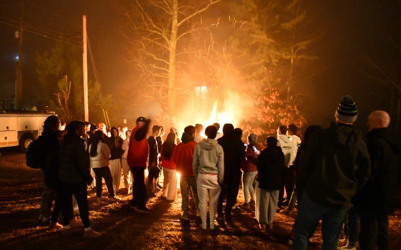 Megan Horn/The Clayton Tribune. Tallulah Falls community members and students at Tallulah Falls School kicked off the holiday season with its annual Town Christmas Party on Friday, Dec. 5. Unique to Tallulah Falls was a giant bonfire that lit up the night sky and warmed eventgoers on a chilly evening.