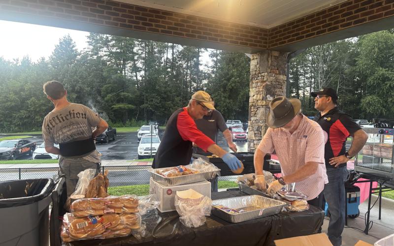 Submitted photo. Carpe Diem Rotary Impact Club members were often seen serving food in the band concession stands at the Rabun County Wildcats football games this season.