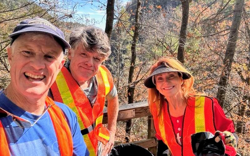 Submitted photo. Mark Holloway, left; Dean White and Sheryl Webster with the Carpe Diem Rotary Impact Club help pick up trash at Tallulah Gorge as part of a monthly cleanup with Friends of Tallulah Gorge State Park in association with Keep Rabun Beautiful.