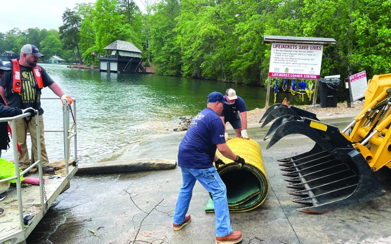 Submitted photo. The LBCA holds an annual Cleanup Day every year in May. The organization works with Georgia Power Company and citizen volunteers for a lake-wide cleanup to help remove debris from Lake Burton.