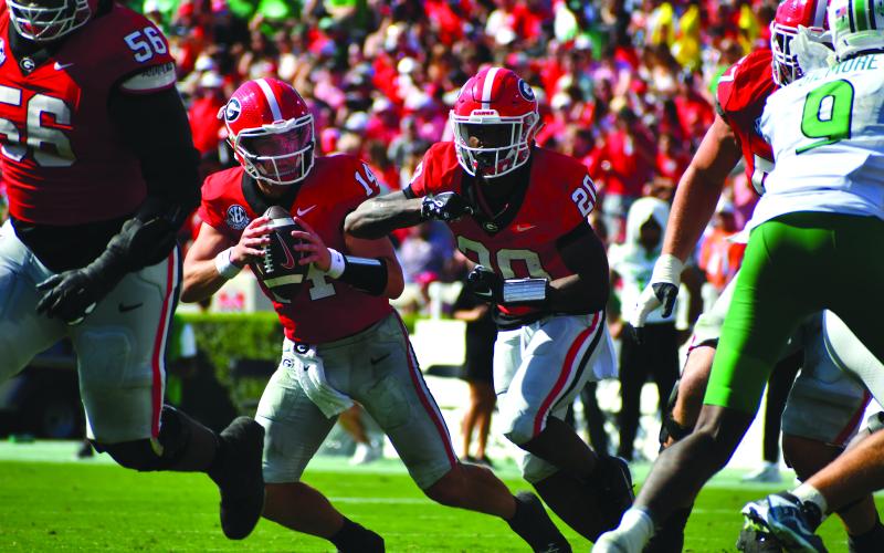 Wesley Branch/The Clayton Tribune. Georgia quarterback Gunner Stockton (14) will lead the Bulldogs against Ole Miss in the College Football Playoffs on Jan. 1 in New Orleans in the Sugar Bowl. Stockton got his first collegiate start in last year’s Sugar Bowl. Stockton has been the starter throughout this season, finishing seventh in the Heisman Trophy voting.