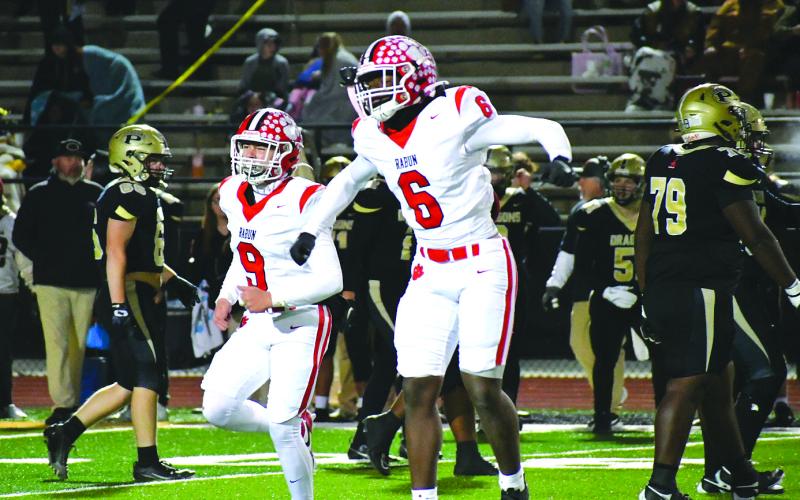 Enoch Autry/The Clayton Tribune. Junior JK Fruster celebrates making a defensive stop in the second half of the Nov. 28 playoff game. Fruster was first team All-Region as a linebacker.