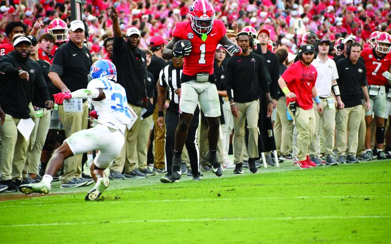Wesley Branch/The Clayton Tribune. Georgia wide receiver Zachariah Branch evades an Ole Miss tackler in Georgia’s 43-35 win over Ole Miss on Oct. 18. Branch and the Bulldogs will face the Rebels in the Allstate Sugar Bowl on New Year’s Day at 8 p.m. Eastern Standard time.  The Bulldogs are led by former Rabun County standout QB Gunner Stockton.