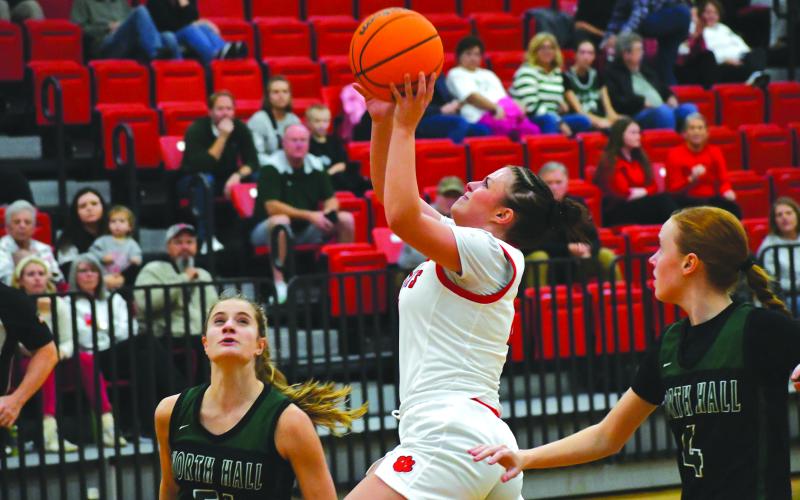 Wesley Branch/The Clayton Tribune. Rabun County junior guard Adelyn Thompson drives in for a layup in Rabun County’s  53-45 win over North Hall on Nov. 25. The Lady Wildcats will be back at home on Dec. 5 versus East Hall.