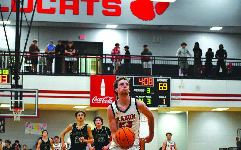 Wesley Branch/The Clayton Tribune. Rabun County senior forward Hayes Free runs in for an uncontested dunk in a 92-68 win over North Hall on Nov. 25. Free scored 16 points and pulled down seven rebounds.