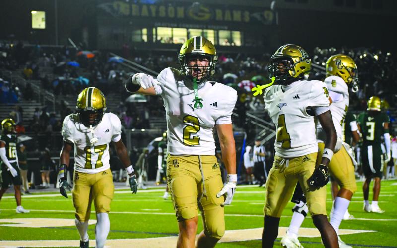 Wesley Branch/The Clayton Tribune. Rabun Gap senior wide receiver Walker Bryson celebrates after a touchdown catch against Grayson on Aug. 22. Bryson was an All-State selection and won conference Player of the Year for the Eagles. Bryson signed in December to play collegiately at Wake Forest.
