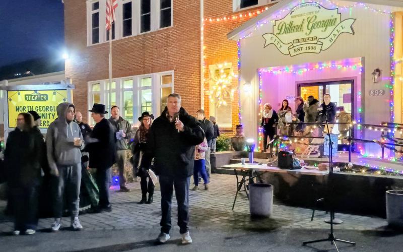 Megan Horn/The Clayton Tribune. City of Dillard Mayor Claude Dillard speaks to a large crowd of community members during the Dec. 3 city tree lighting event. He thanked everyone for coming to one of the biggest events the city has ever had.