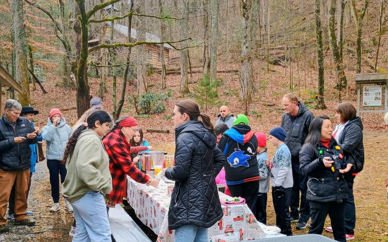 Megan Horn/The Clayton Tribune. New to “A Foxfire Christmas” this year was candle making with Jenny Stevens at the Reeves Pavilion. Many people participated in the craft.