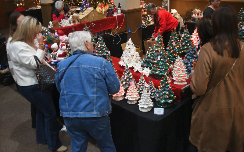 Enoch Autry/The Clayton Tribune. While 40 trees were available for bids during a silent auction, little cermamic ones were available for purchase. Plenty of apparel was on hand to buy in a variety of styles for practically everyone.