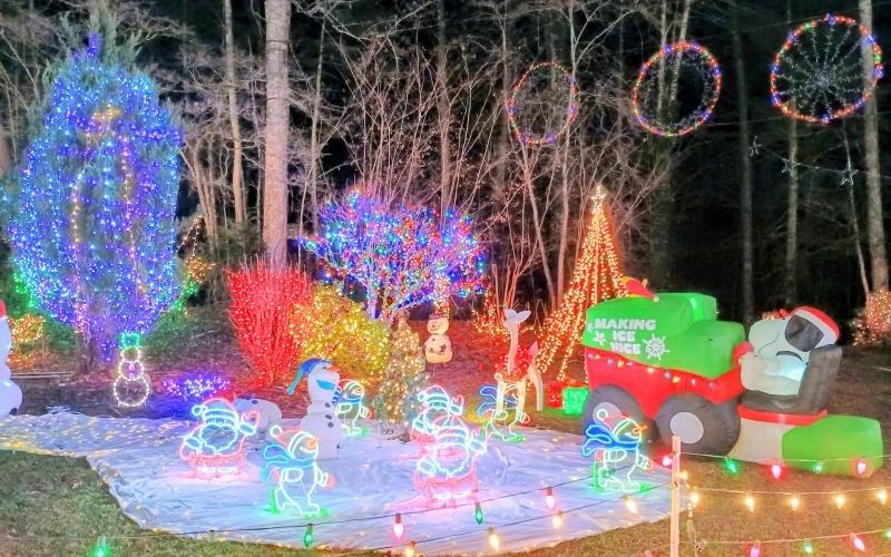 Megan Horn/The Clayton Tribune. There are many fun characters to see at this weekend’s Christmas Village of Lights event to support F.A.I.T.H. It will be Friday, Dec. 19, and Saturday, Dec. 20, from 5:30 p.m. to 8:30 p.m. at 90 Tiger Connector, Tiger. The display offers family-friendly fun and features thousands of lights, characters and decorations, synced to Christmas music for a sing-along. Those passing by can even tune in to 98.7 to enjoy the music.