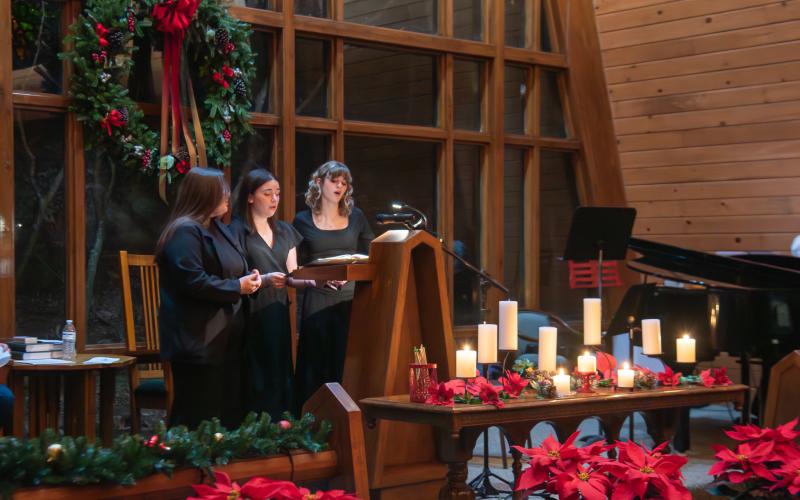 Submitted photo. Allison York, Emma Ivester, and Olivia Bonner sing “Noel” at the TFS Candlelight Service.